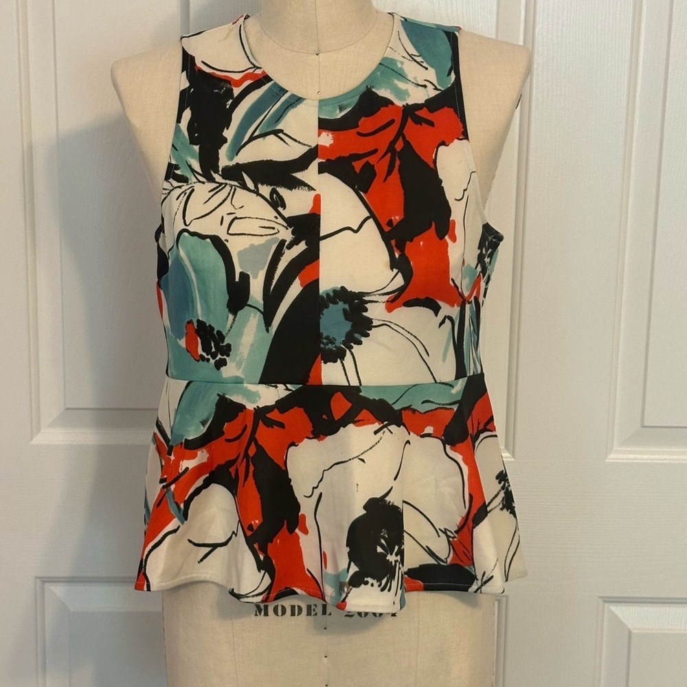 Blue and Black Sleeveless Peplum Blouse